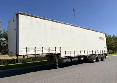 White Tri-Axle Tautliner